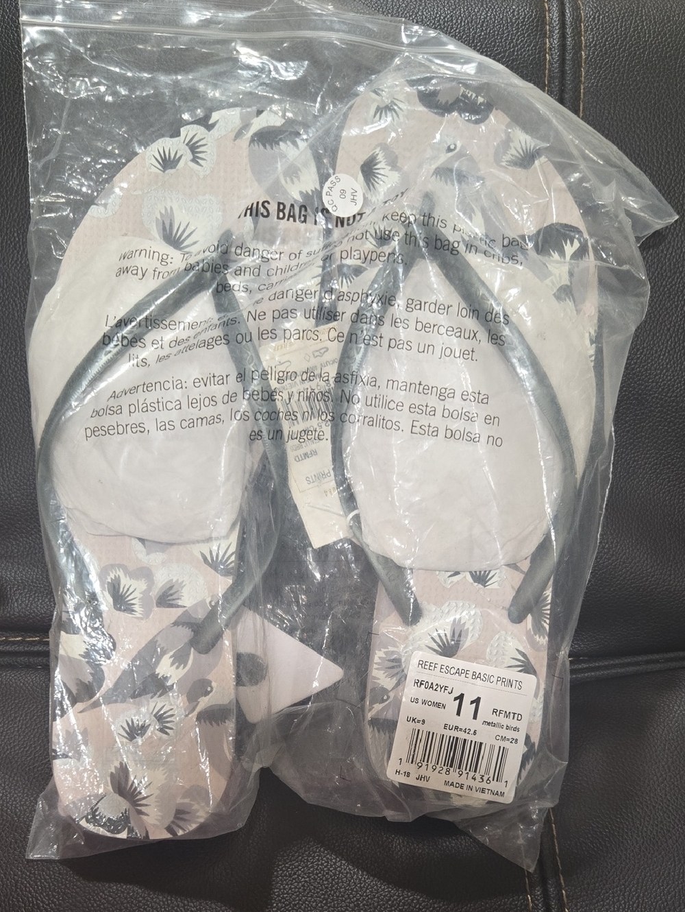 Reef Women's Flip Flops with Floral Print and Black Straps